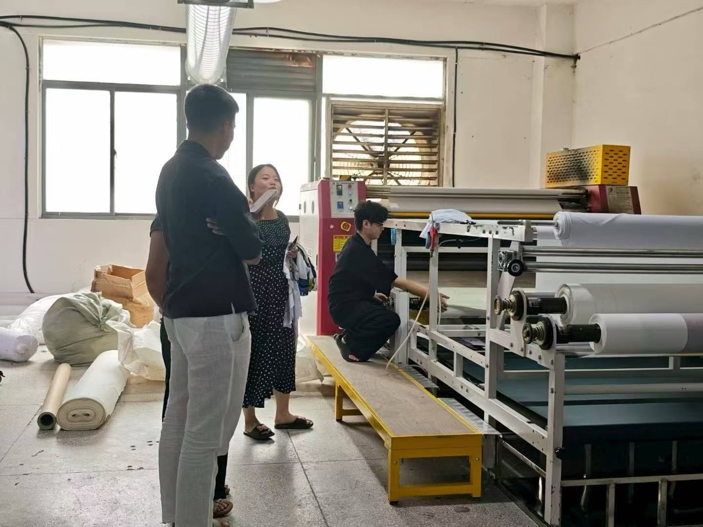 Our team inspecting the lamination line