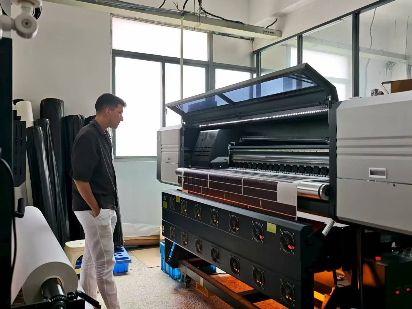 Checking the sublimation printer on a factory visit