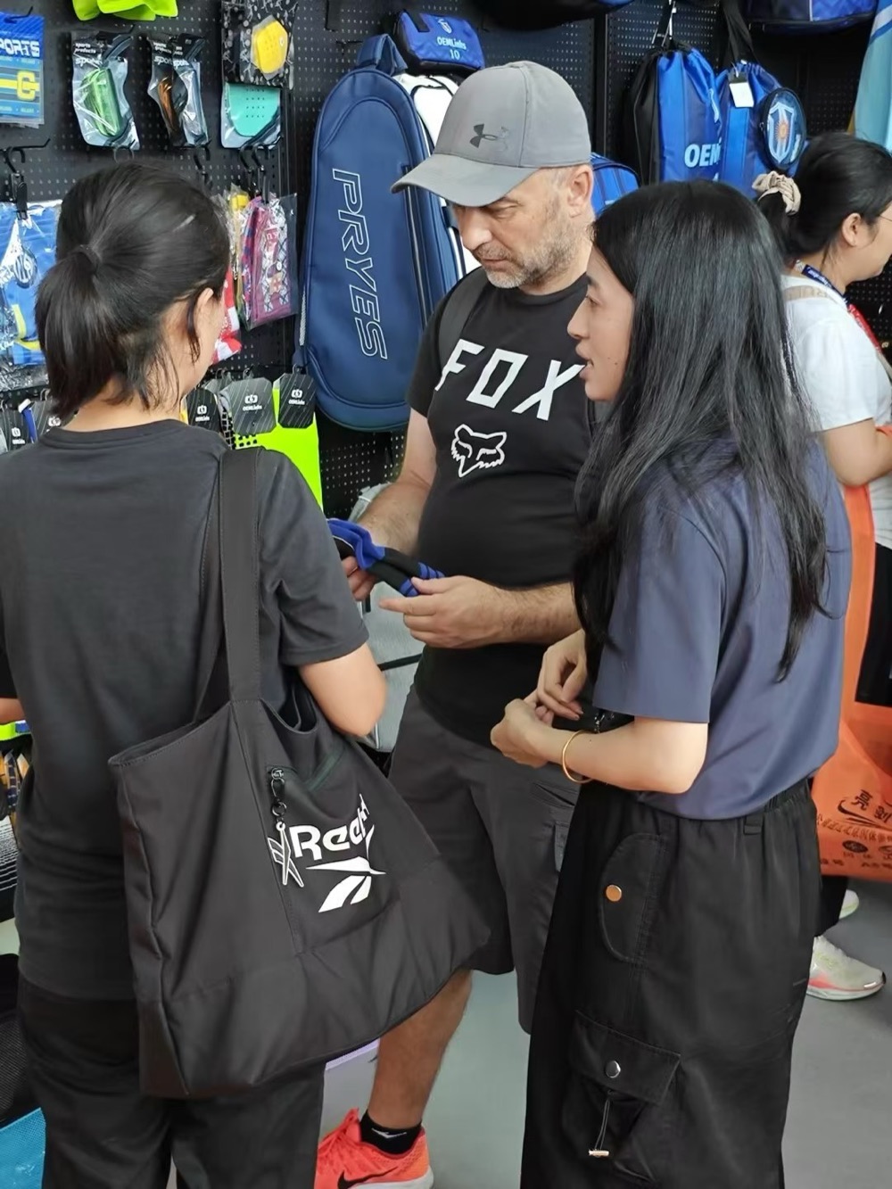 An overseas buyer being shown a product